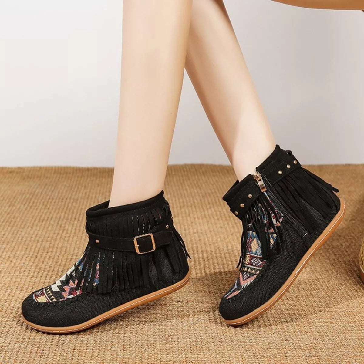 Fringe side zipper ankle boots, heel detail