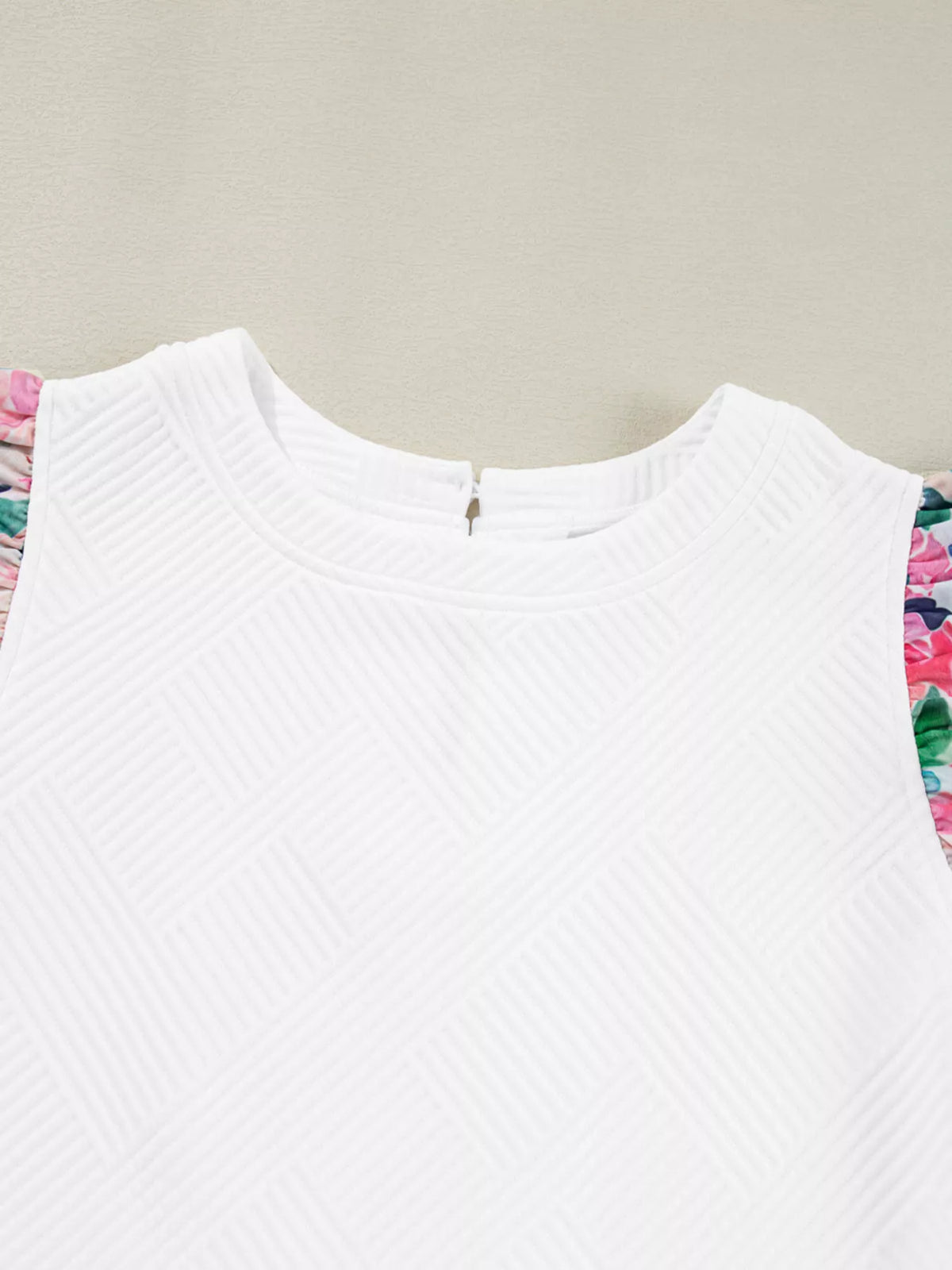 White abstract print tiered ruffle sleeve top side view