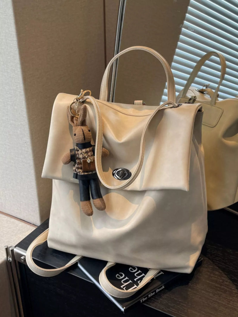 Cream PU leather flap backpack front view