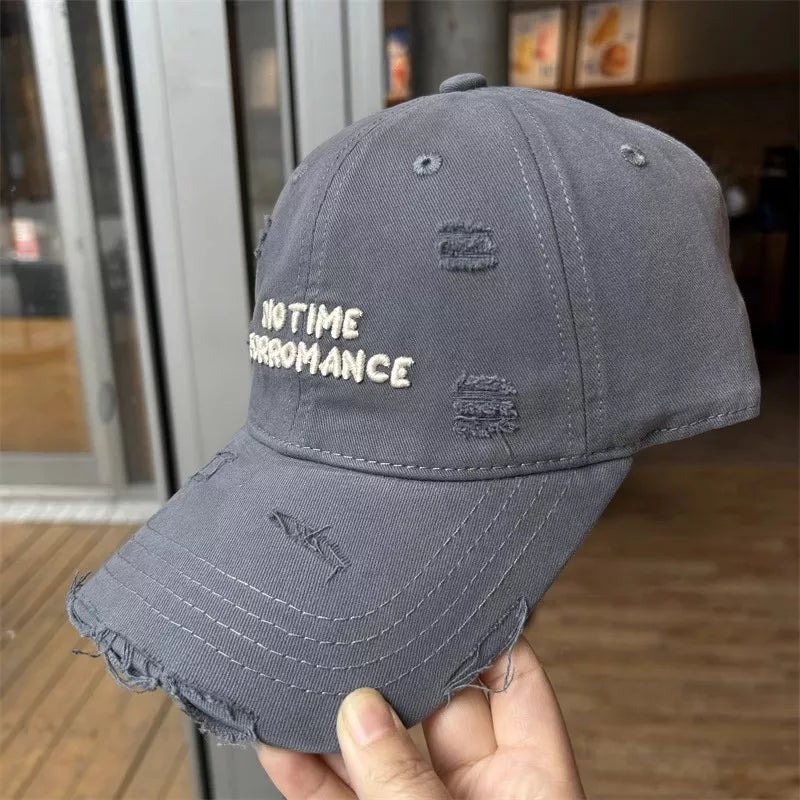 Distressed baseball cap in a darker shade