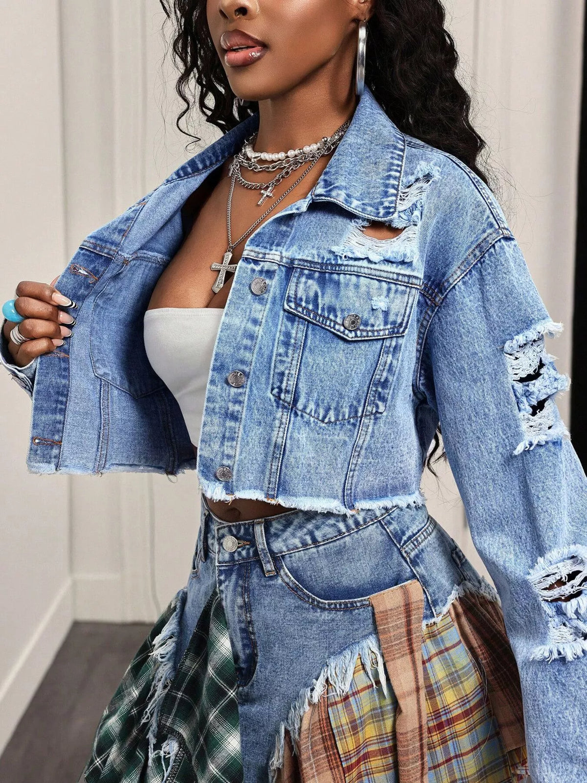 Blue cropped denim jacket side view