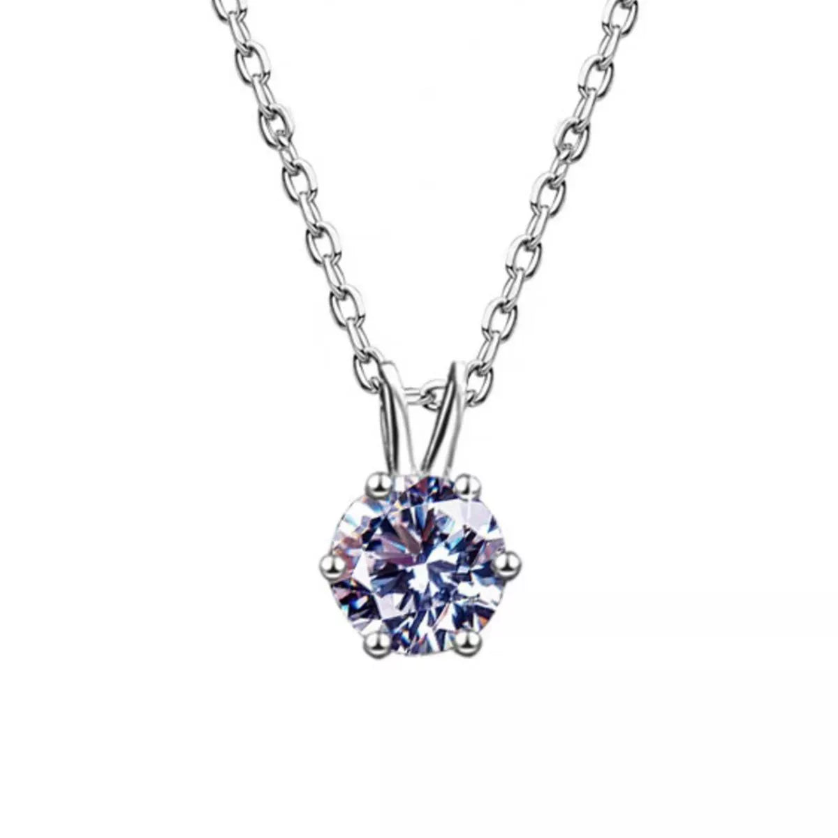Moissanite pendant catching the light at an angle