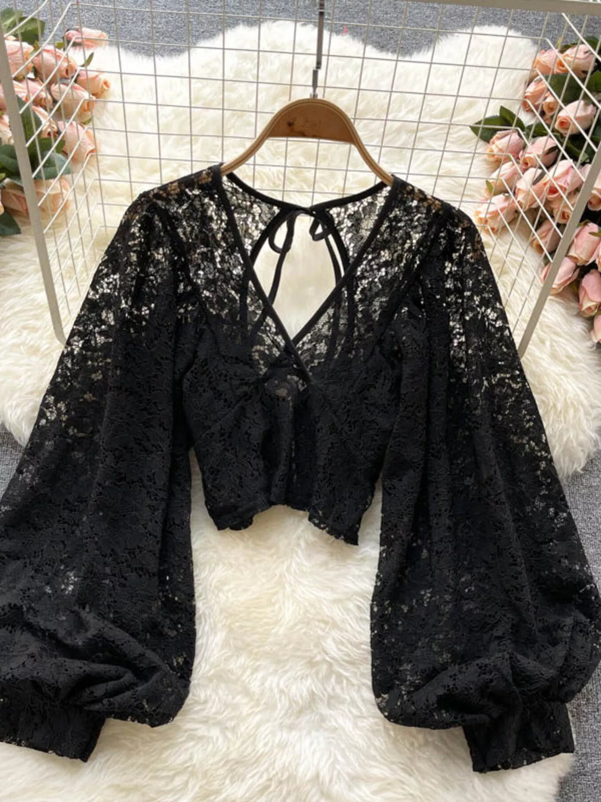 Lace tie back long sleeve top, angled view