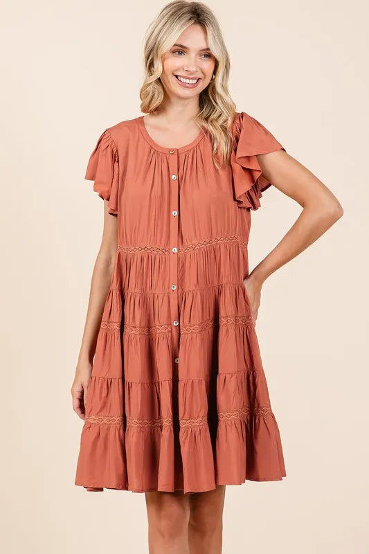 Lace detail on tiered dress bodice