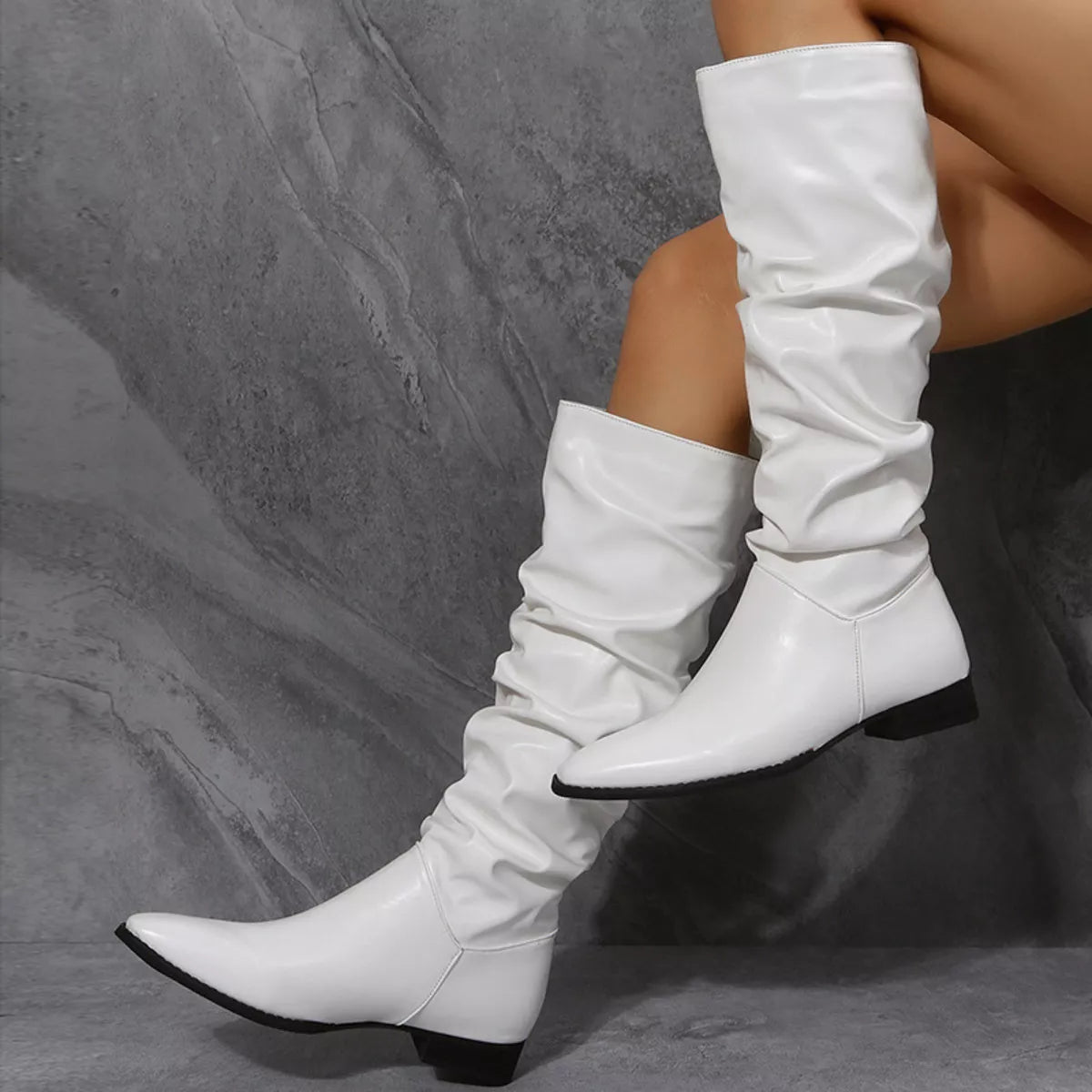 White slouchy block heel boots top styling detail