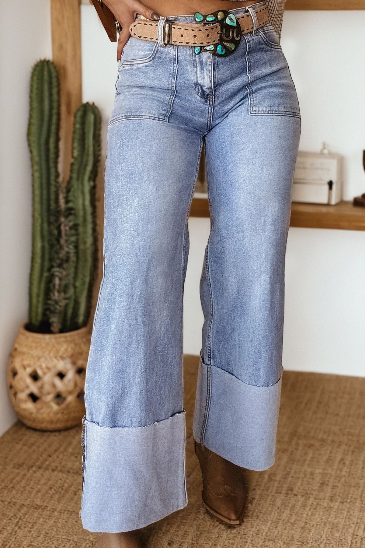 Blue wide leg loose jeans front view with turn up cuffs