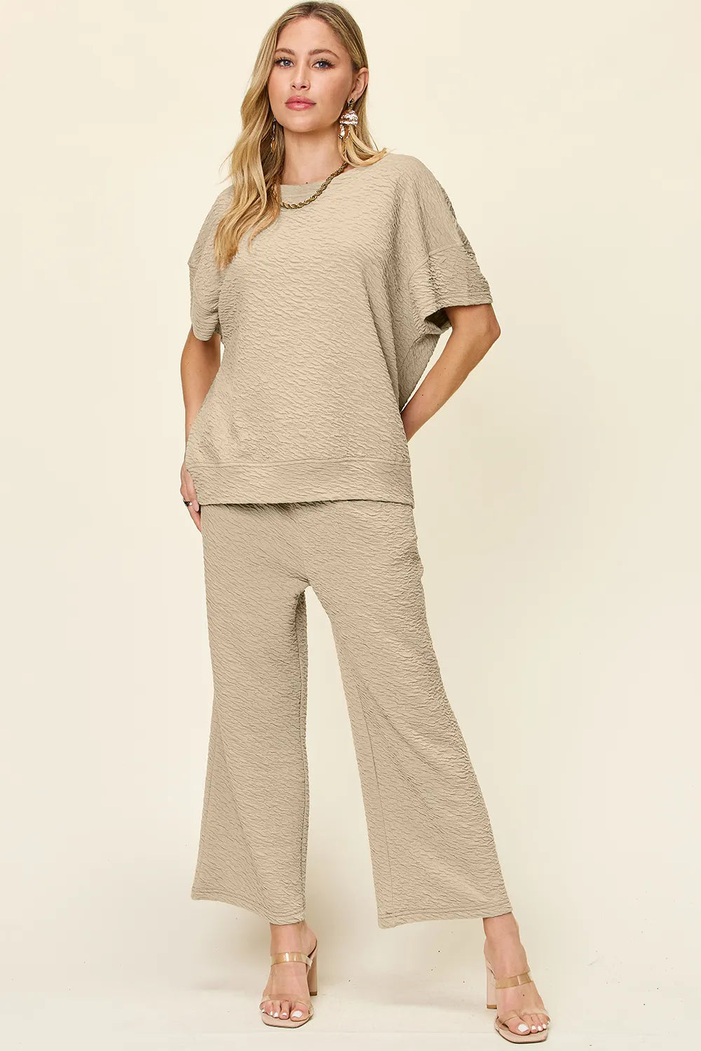 Textured short sleeve top and pants set front view on model