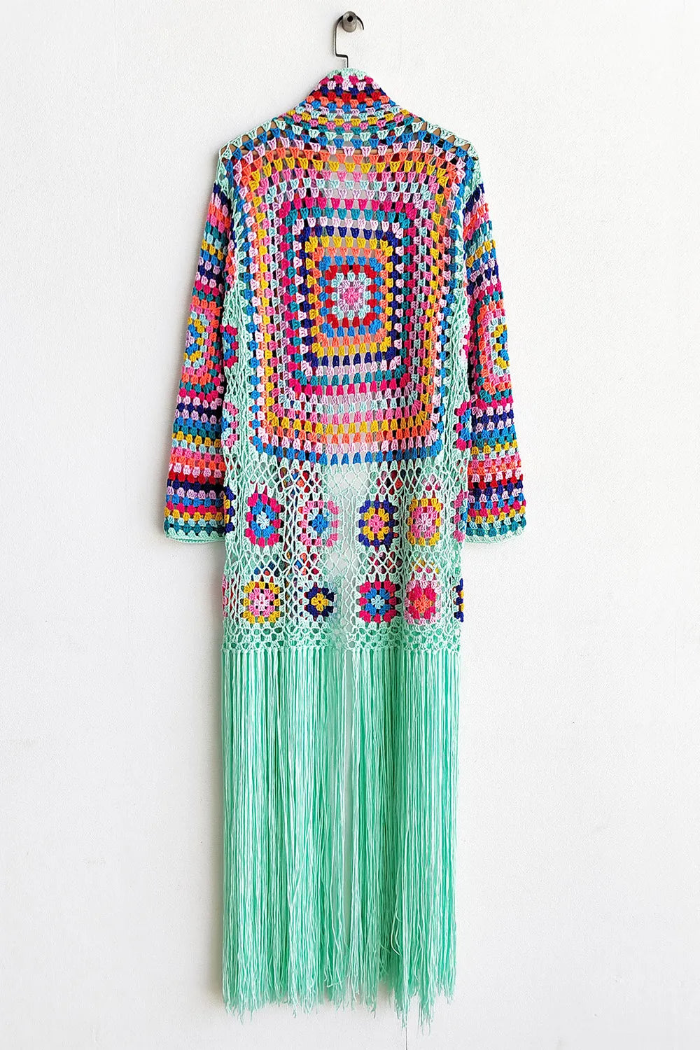 Fringe duster cardigan styled with jeans