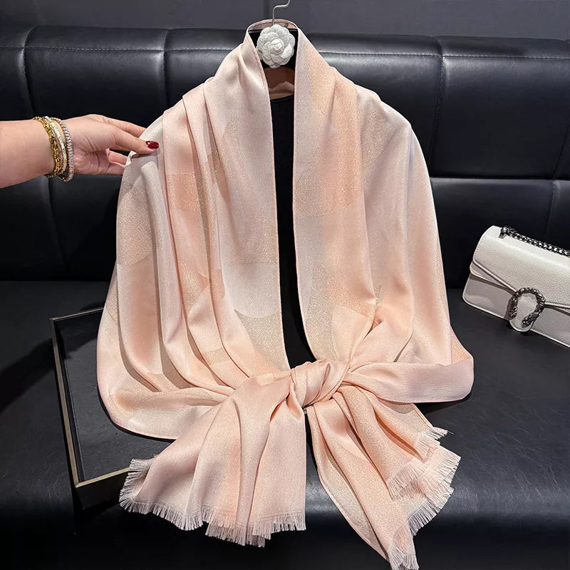 Soft lightweight scarf styled over a top