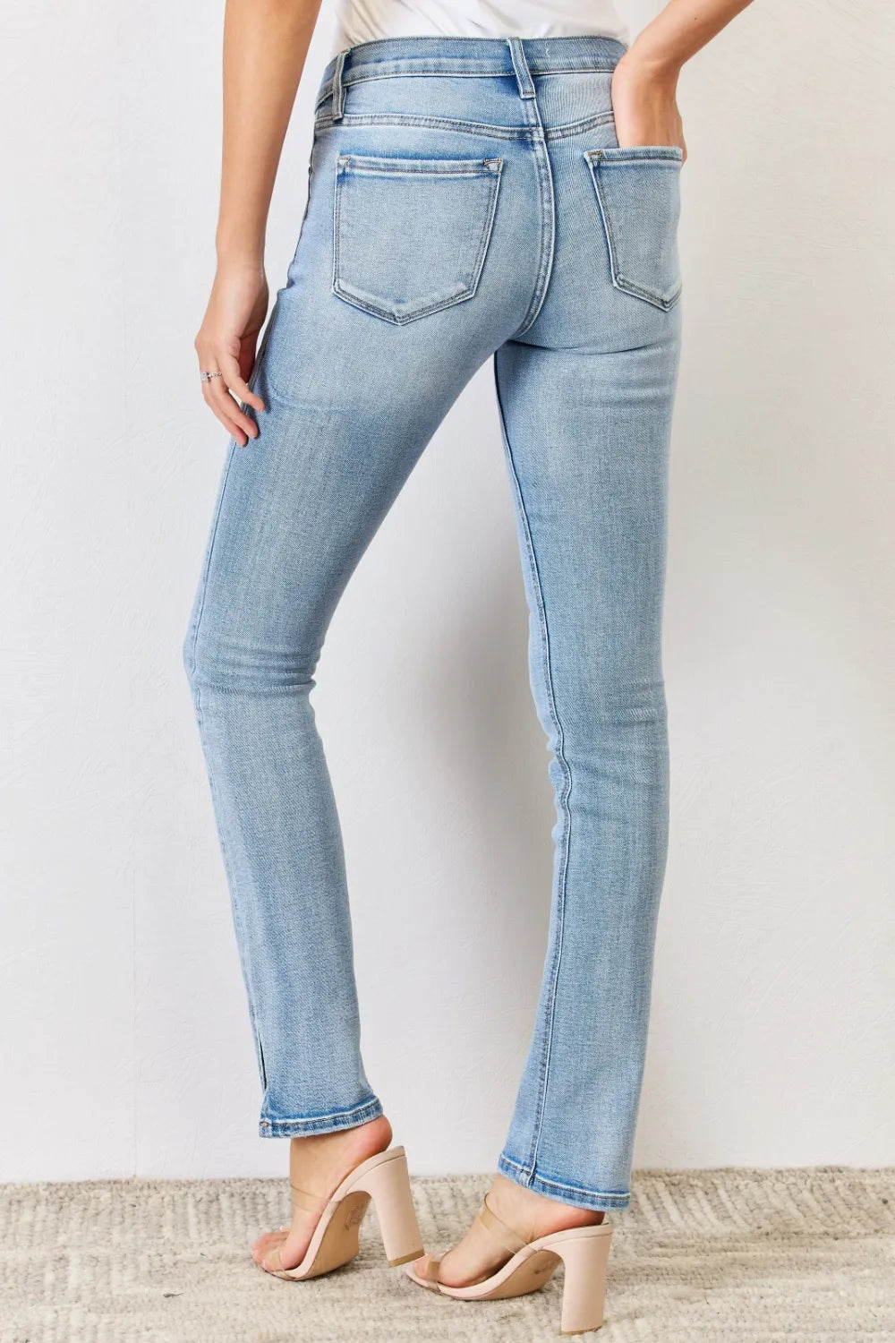 Back view of mid rise bootcut denim