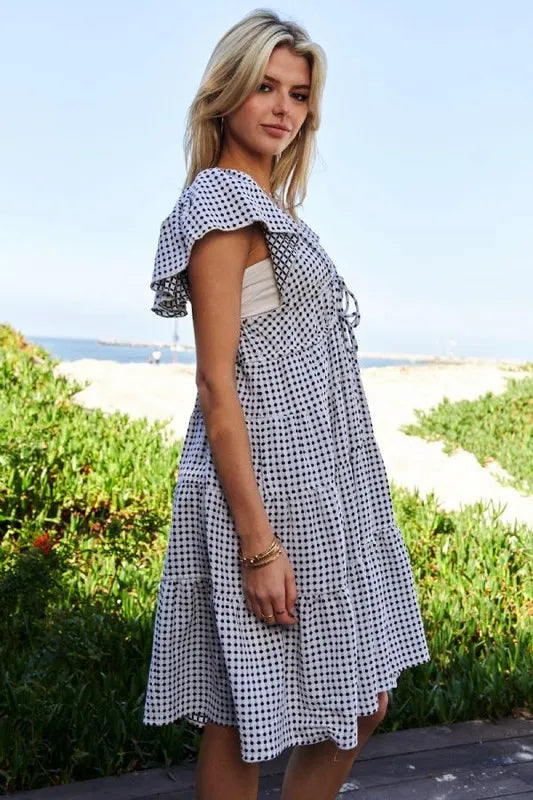 Jacquard V Neck Flutter Sleeve Tiered Dress in Black and Ivory side view