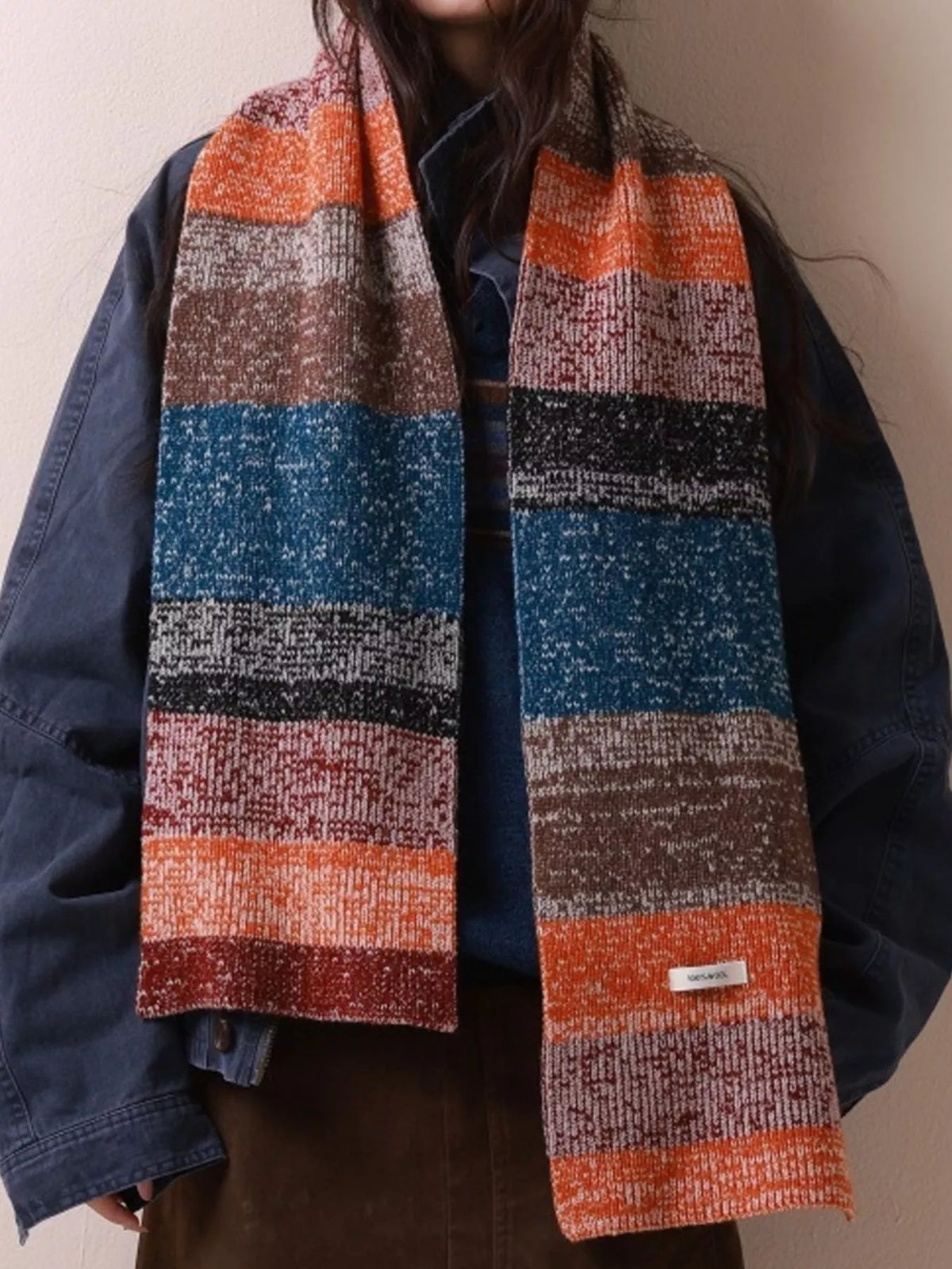 Warm wool scarf styled for cold weather