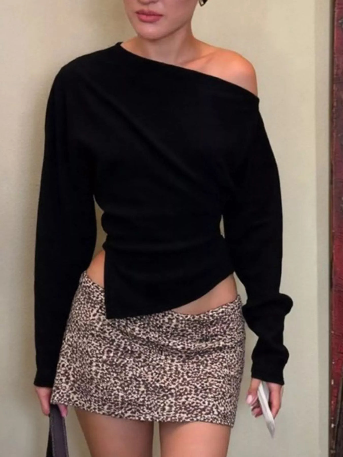 Navy blue off shoulder top shown from the front