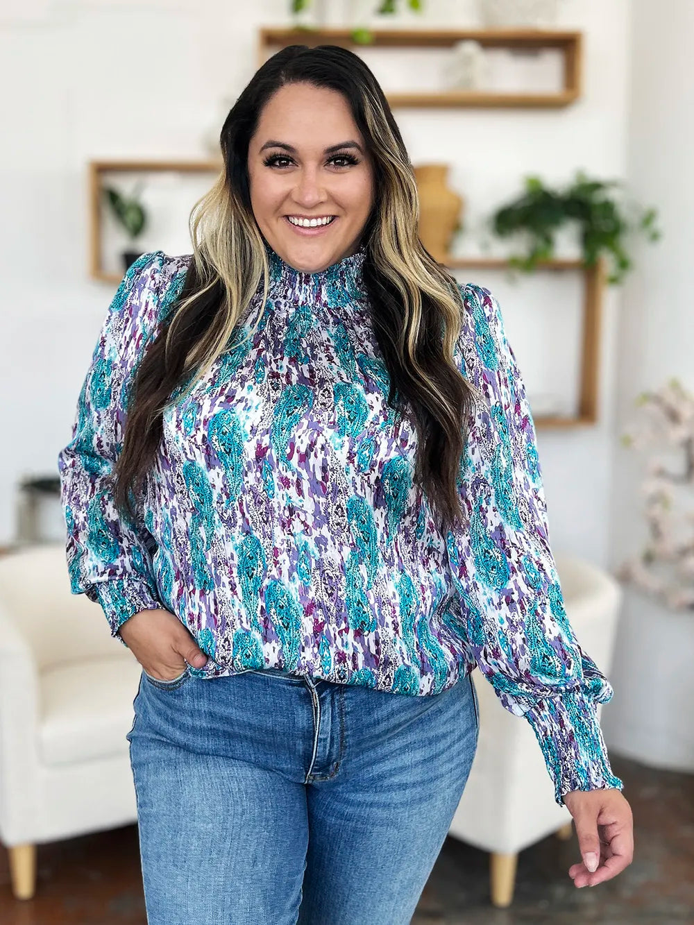 Hem detail of the printed long sleeve blouse