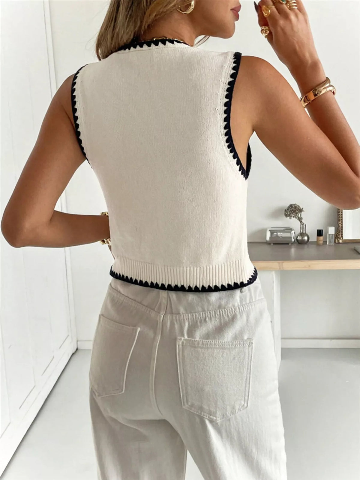 Button up knit vest side view