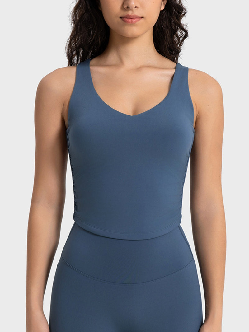 Cropped sport tank top front view in peacock blue