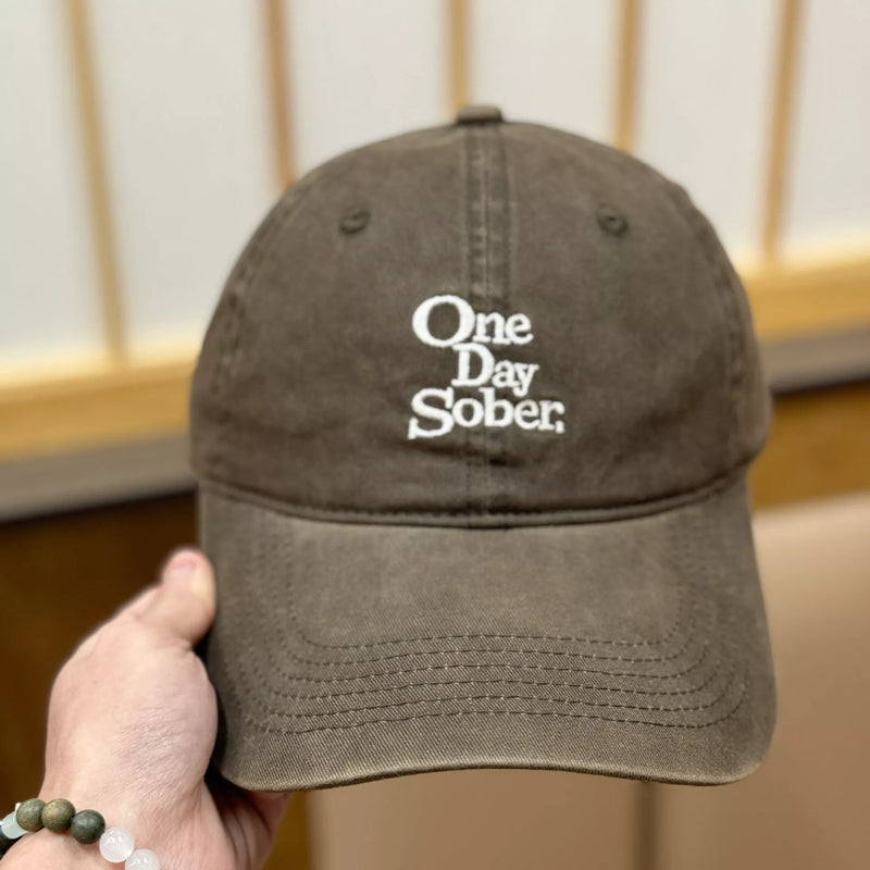 Monarch Millinery embroidered letter baseball cap in brown front view