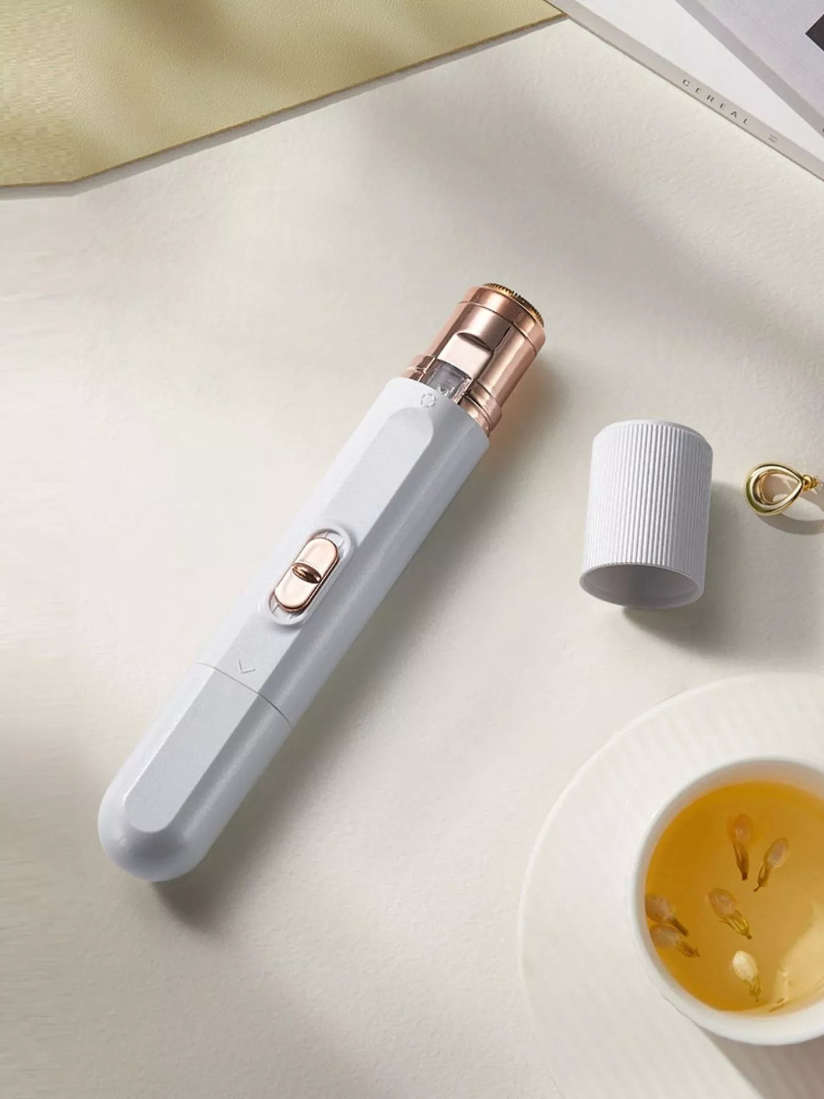 Pen shown removing facial hair