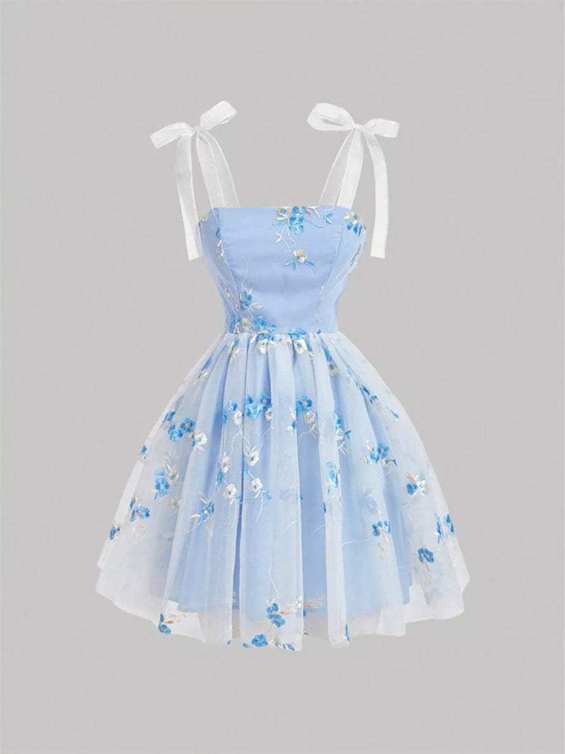 Blue floral embroidered tie shoulder dress front view