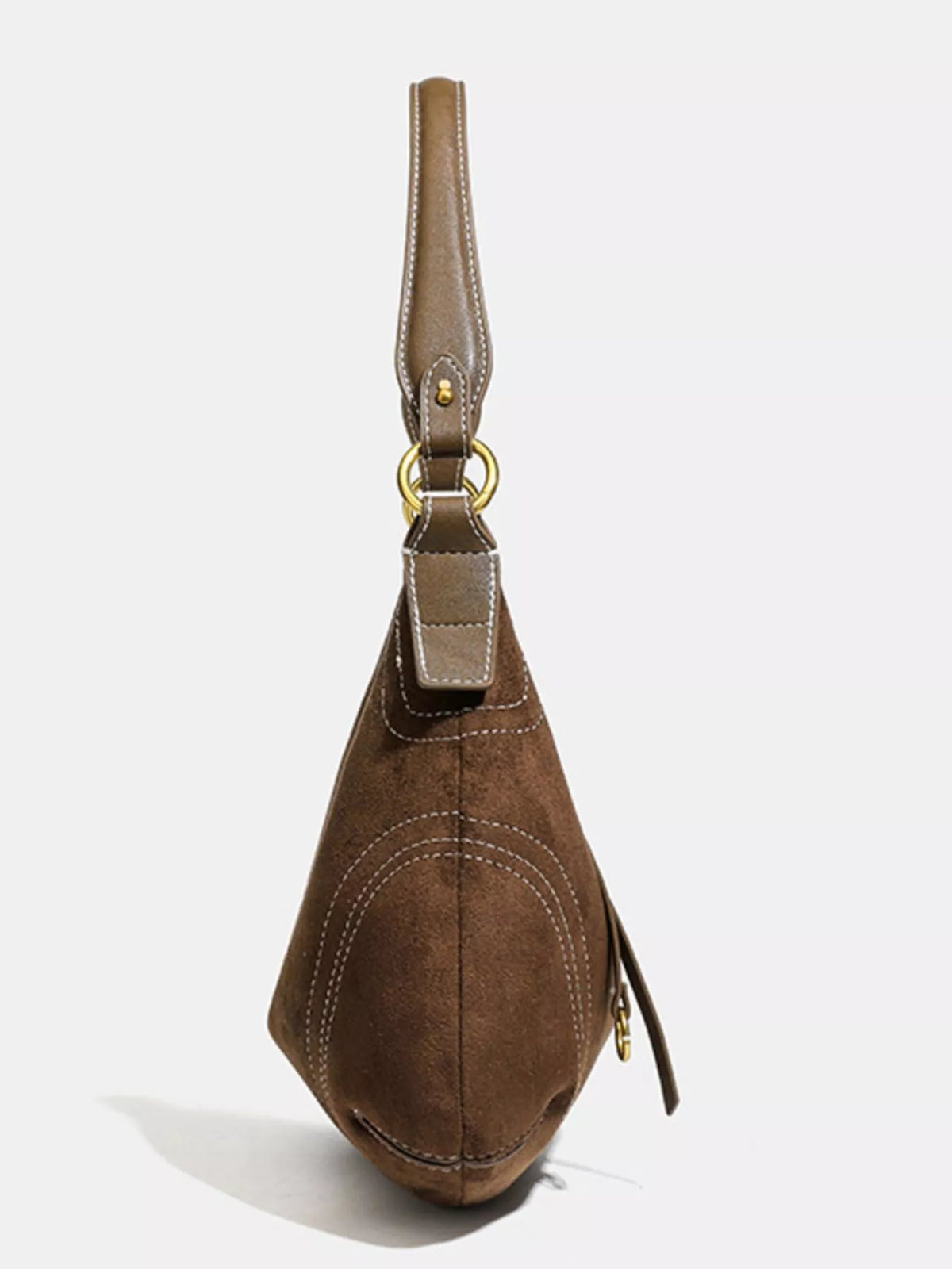 Suede hobo bag held by model