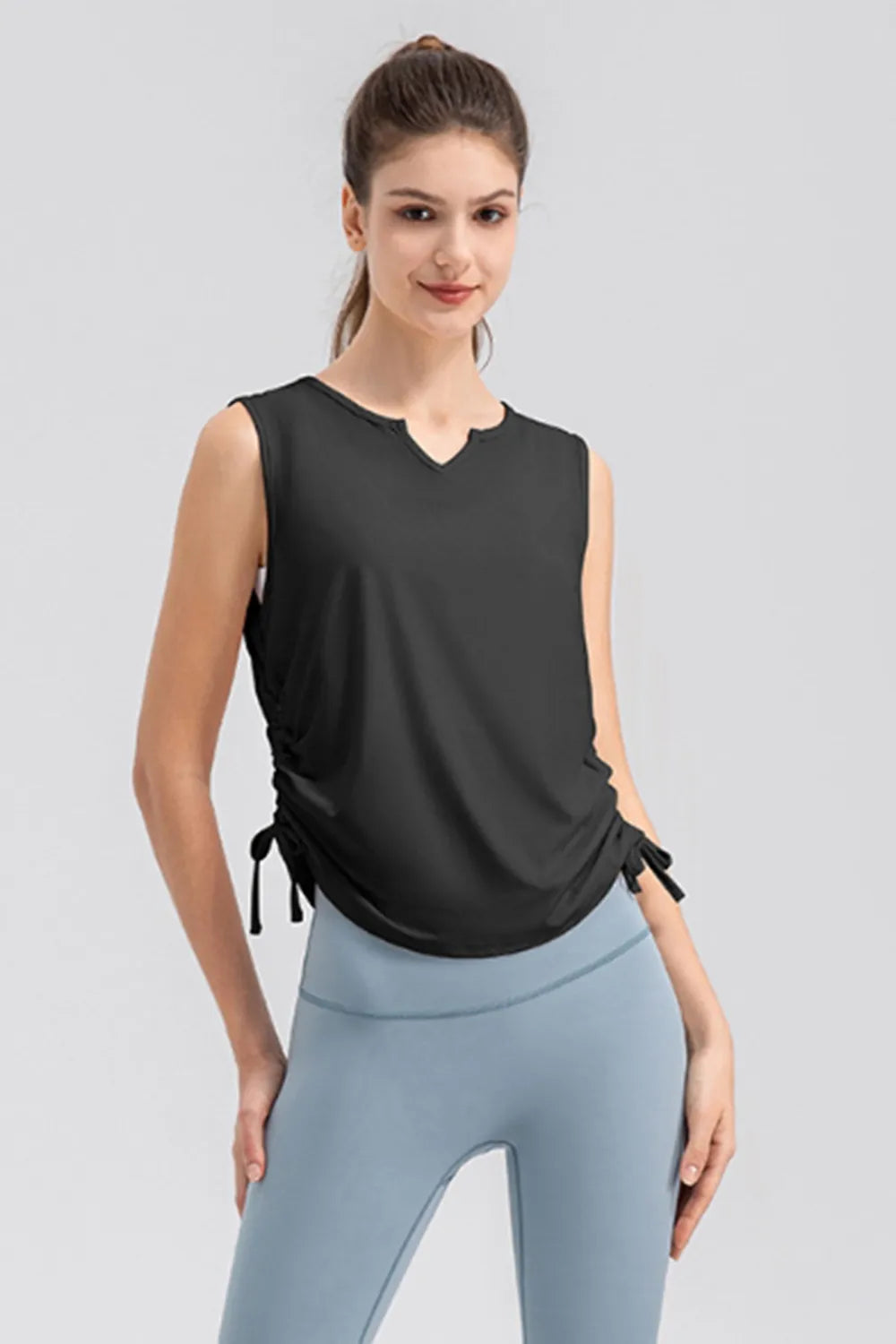 Notched neck wide strap active tank fabric detail
