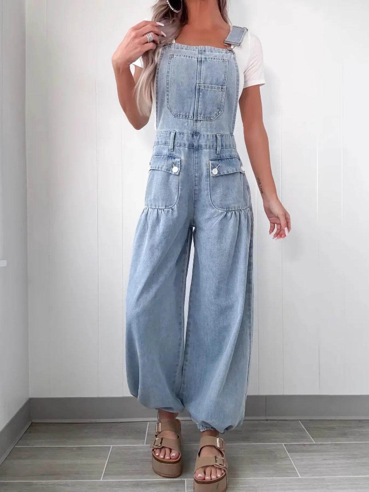 Wide leg buttoned denim overalls front view