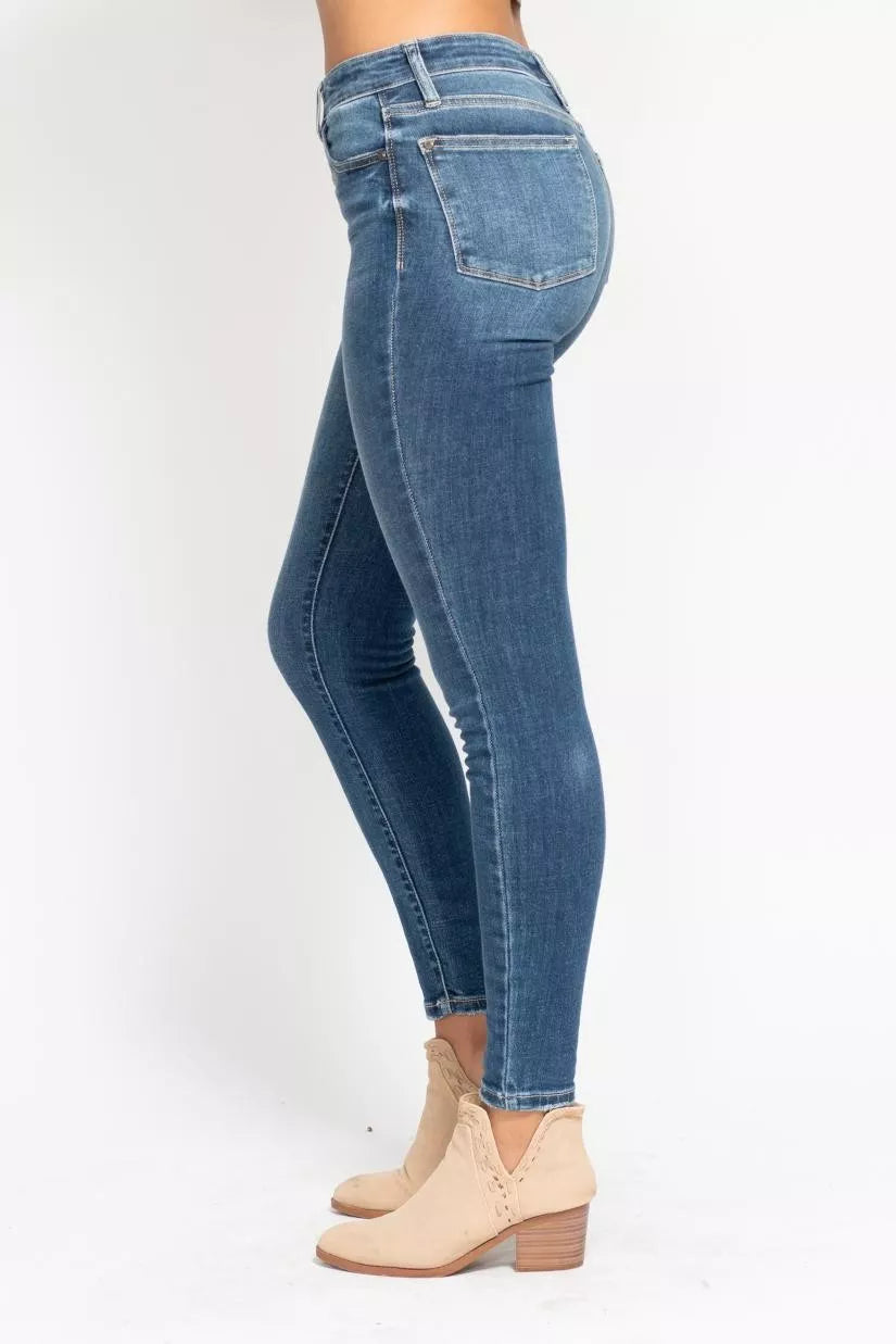 Retro button fly detail on high rise jeans