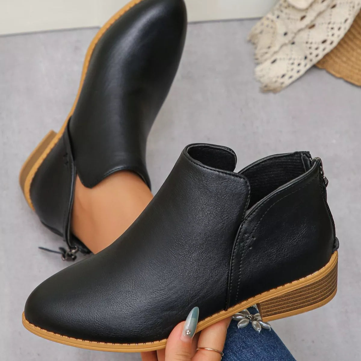 Point toe block heel ankle boots editorial shot