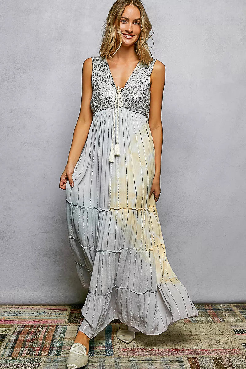 Light grey sleeveless tiered maxi dress side view