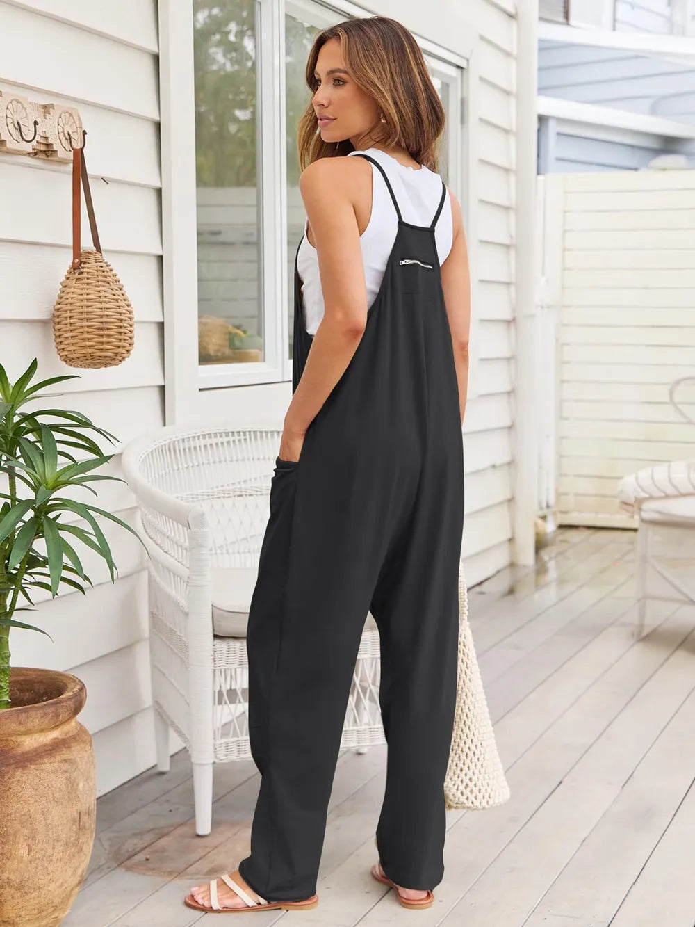 V neck jumpsuit back and strap detail