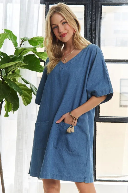Blue denim mini dress back view