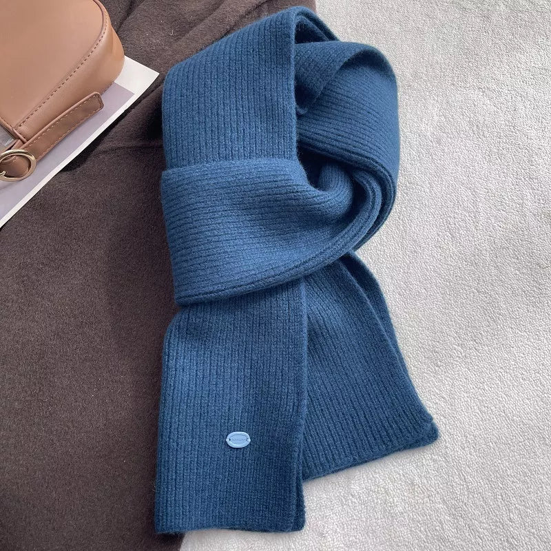 Wool knit scarf shown in a deep color option