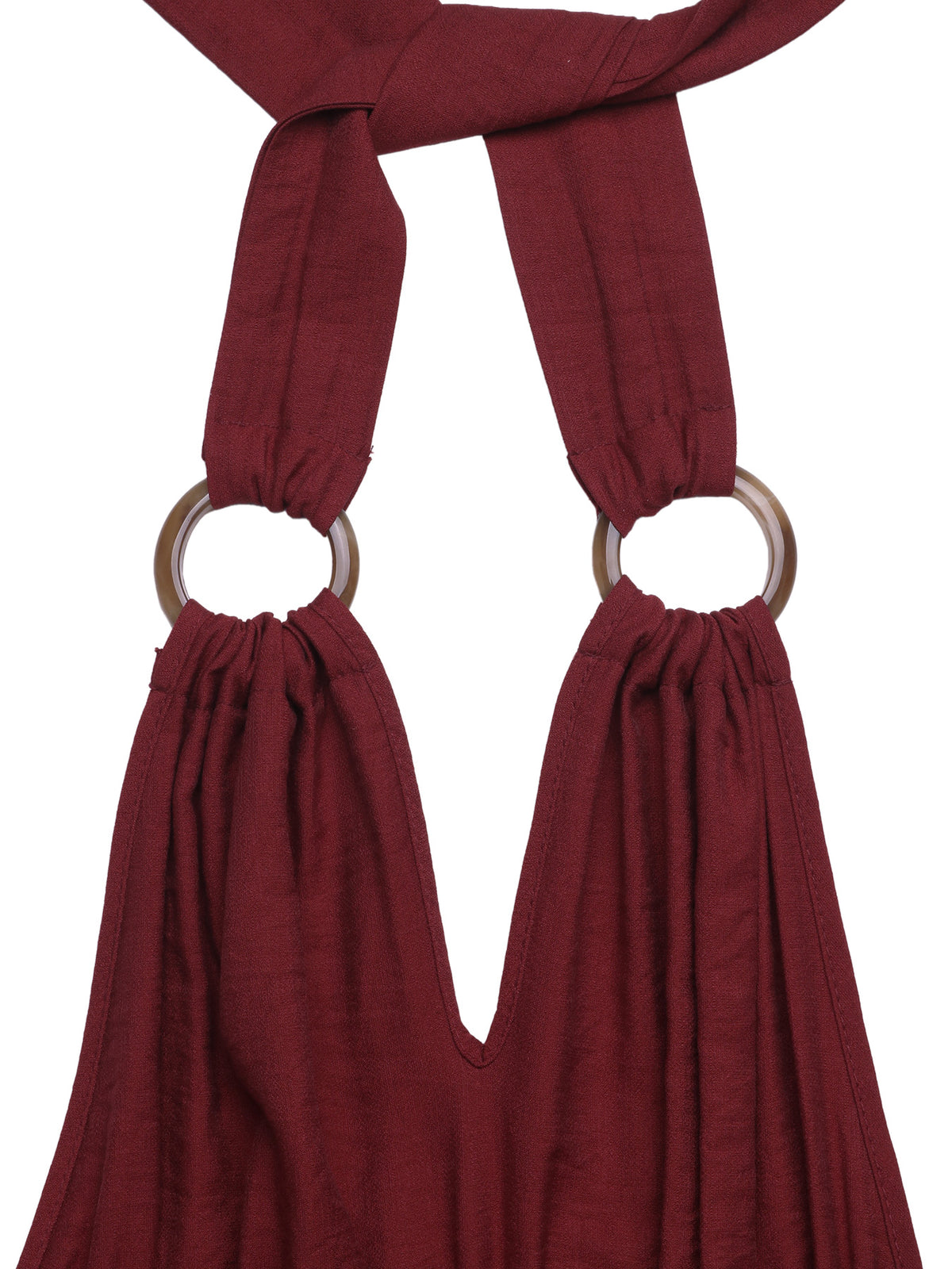 Three quarter view of the burgundy jumpsuit