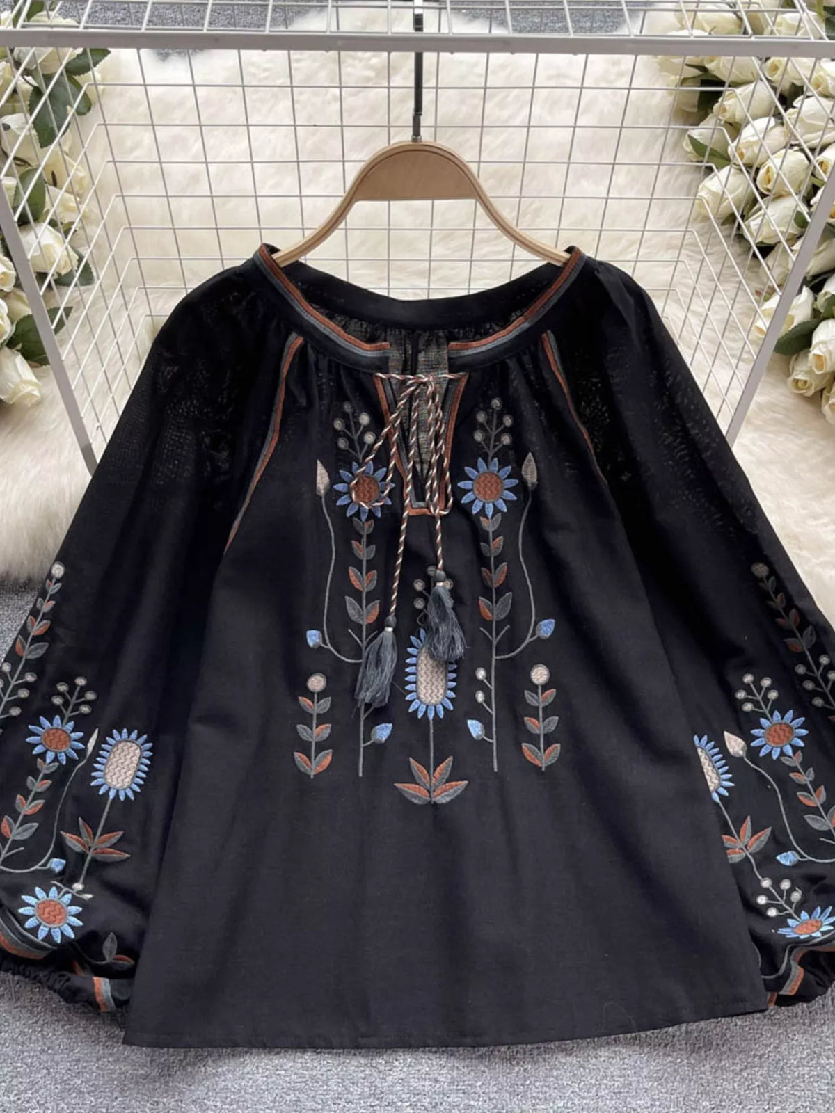 Embroidered blouse in apricot, styled full length
