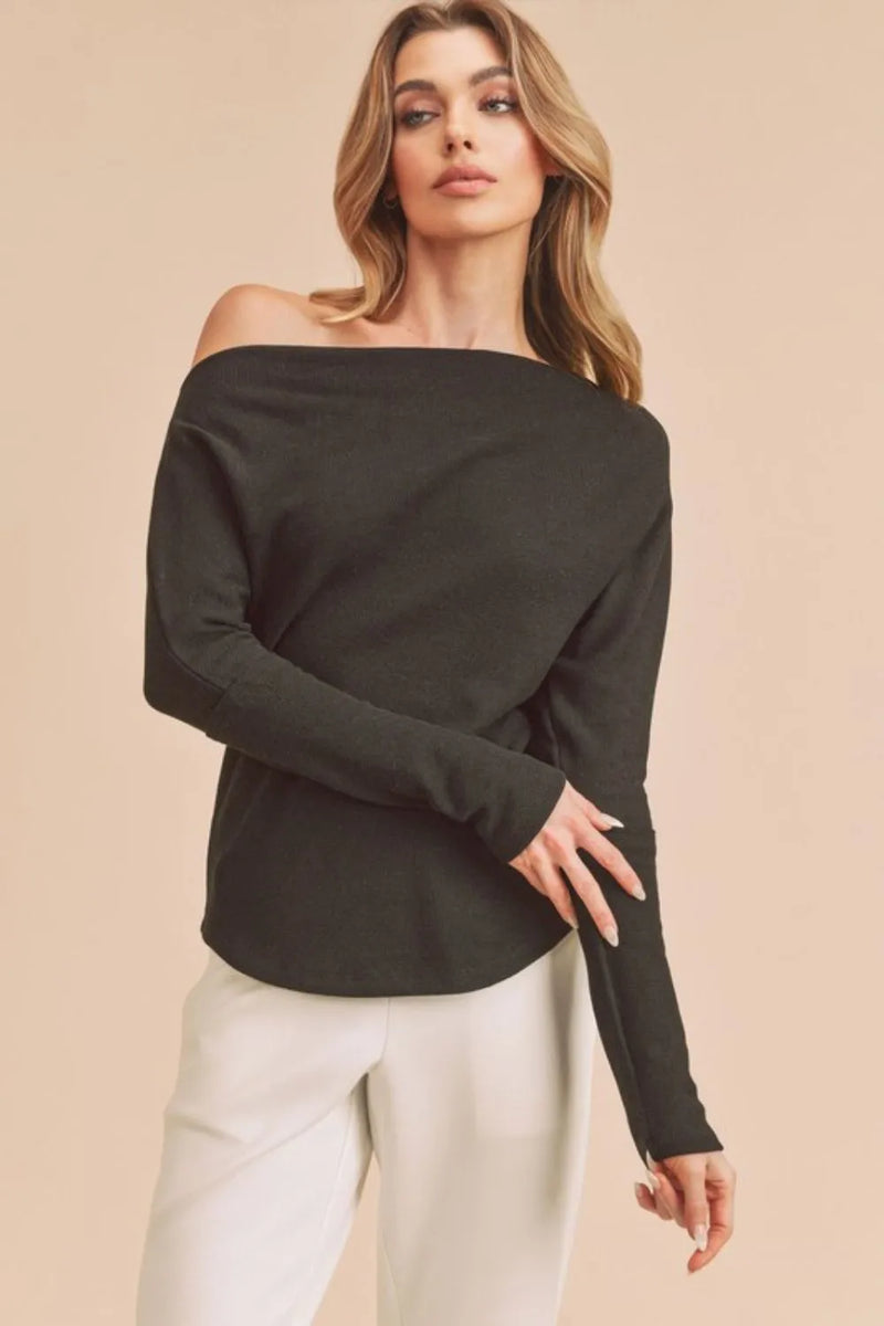 One shoulder long sleeve knit top in black front view