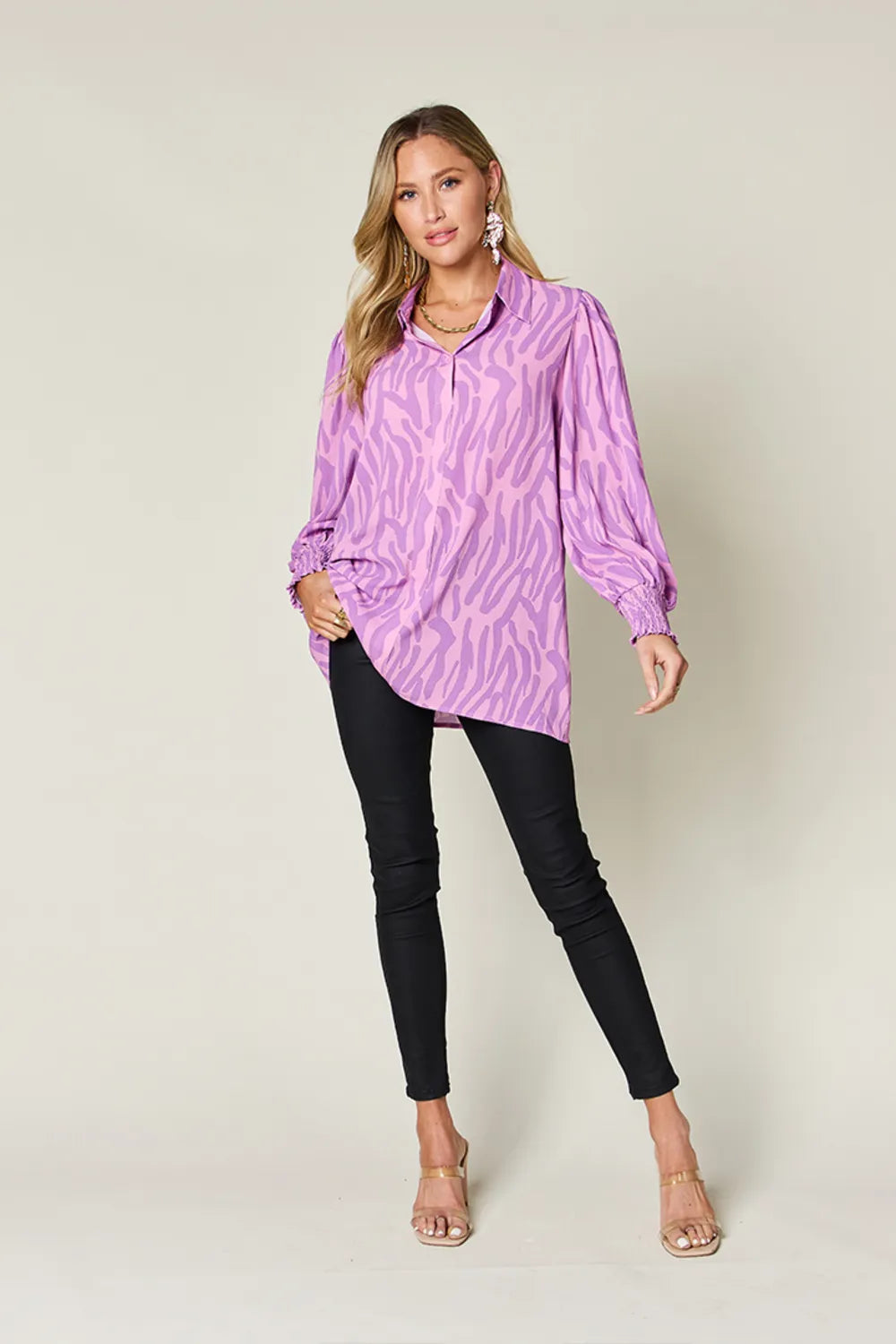 Ruched fabric detail of the printed blouse