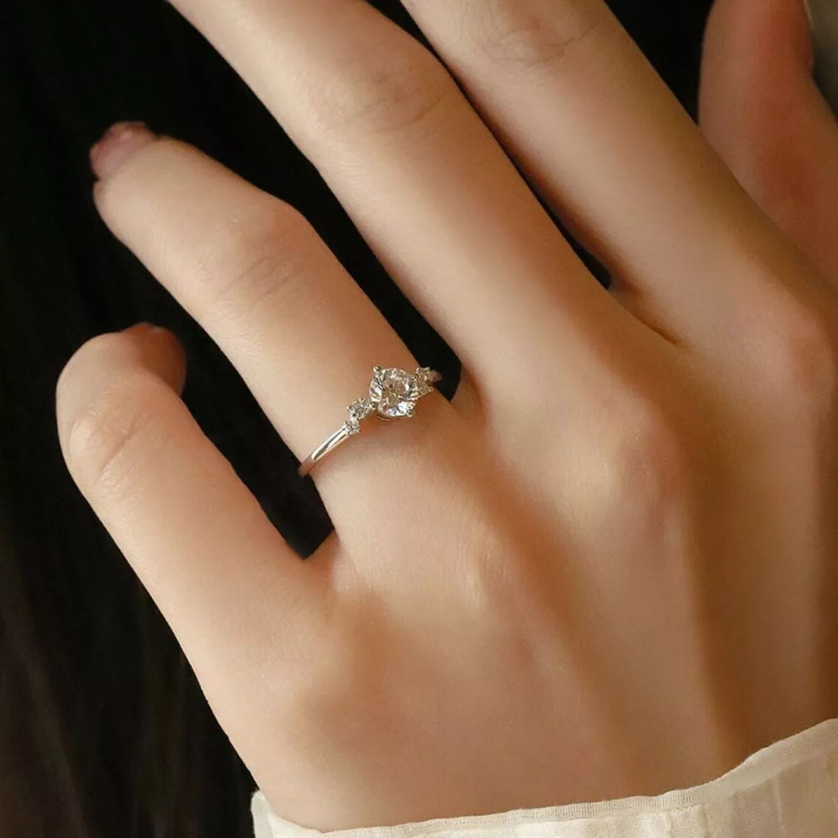 Close up of moissanite stone in silver setting