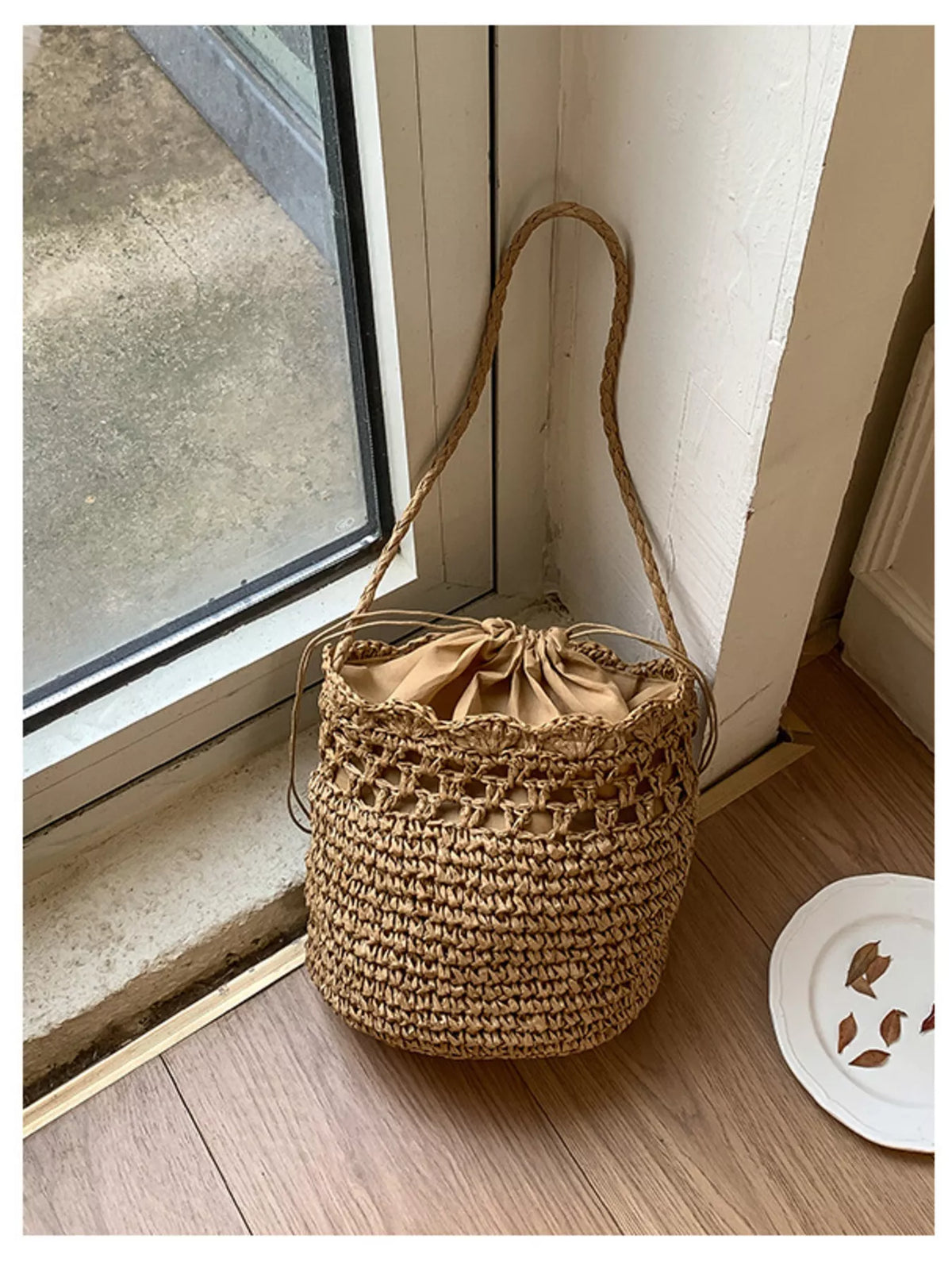 Woven khaki bucket bag back view