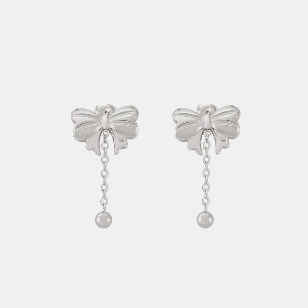 Bow earrings shown in silver finish