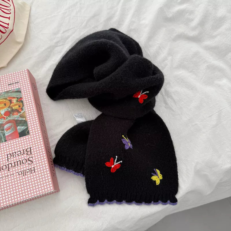 Butterfly scarf shown wrapped snugly for warmth