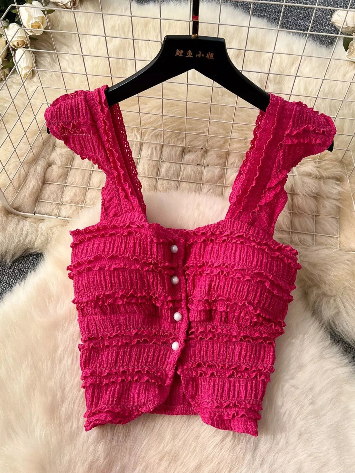 Coordinated textured crop top and tiered skirt set detail
