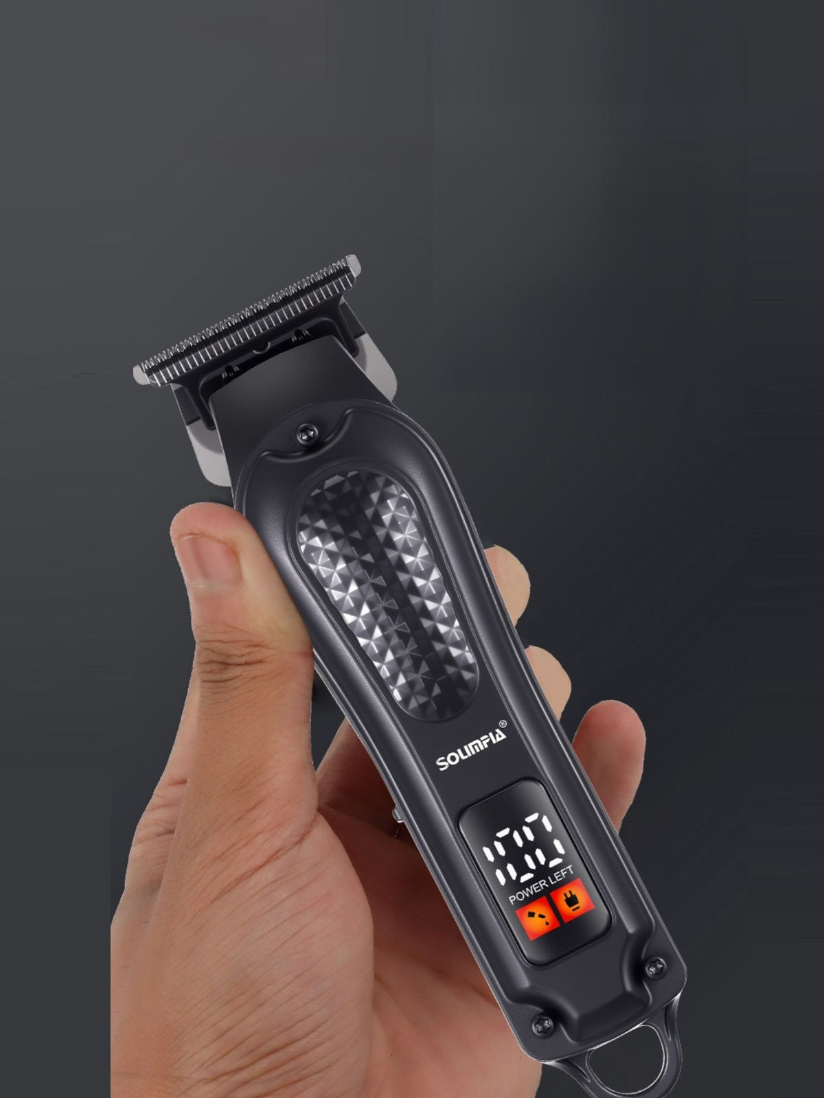 Hair clipper held in hand