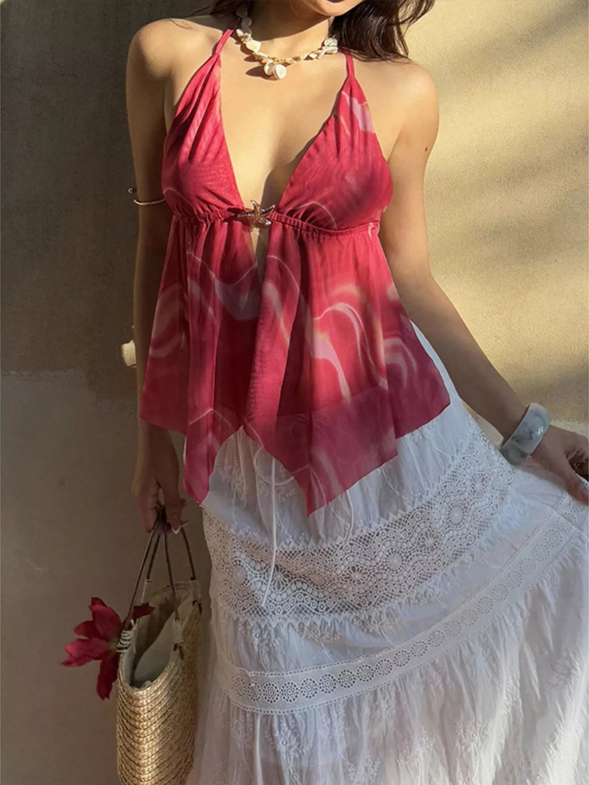 Halter neck cami top shown from the side on a model
