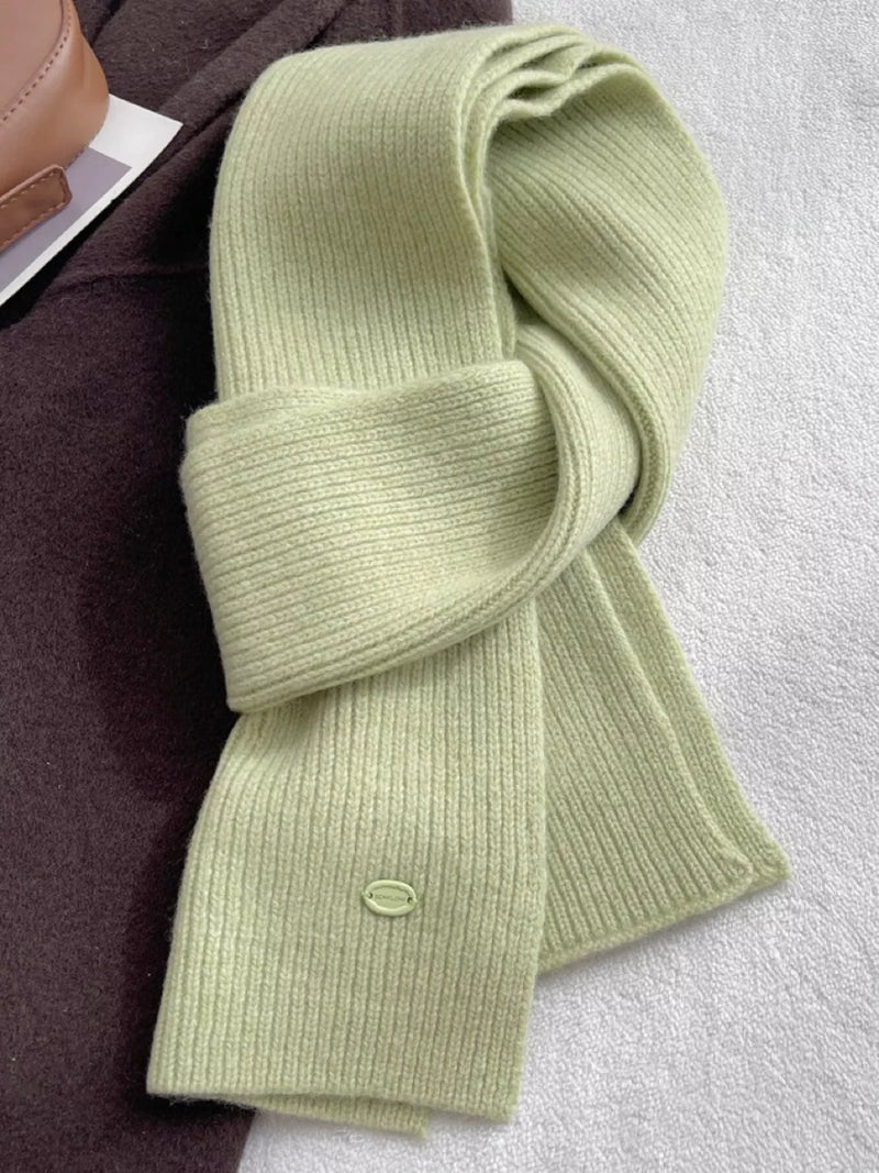 Pure wool soft knit scarf wrapped around the neck