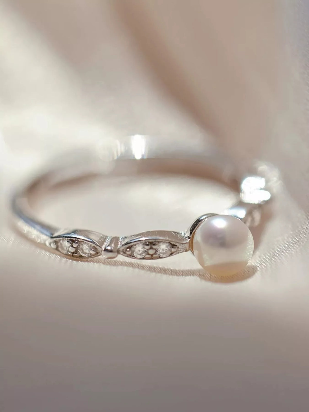 Sterling silver pearl ring flat lay
