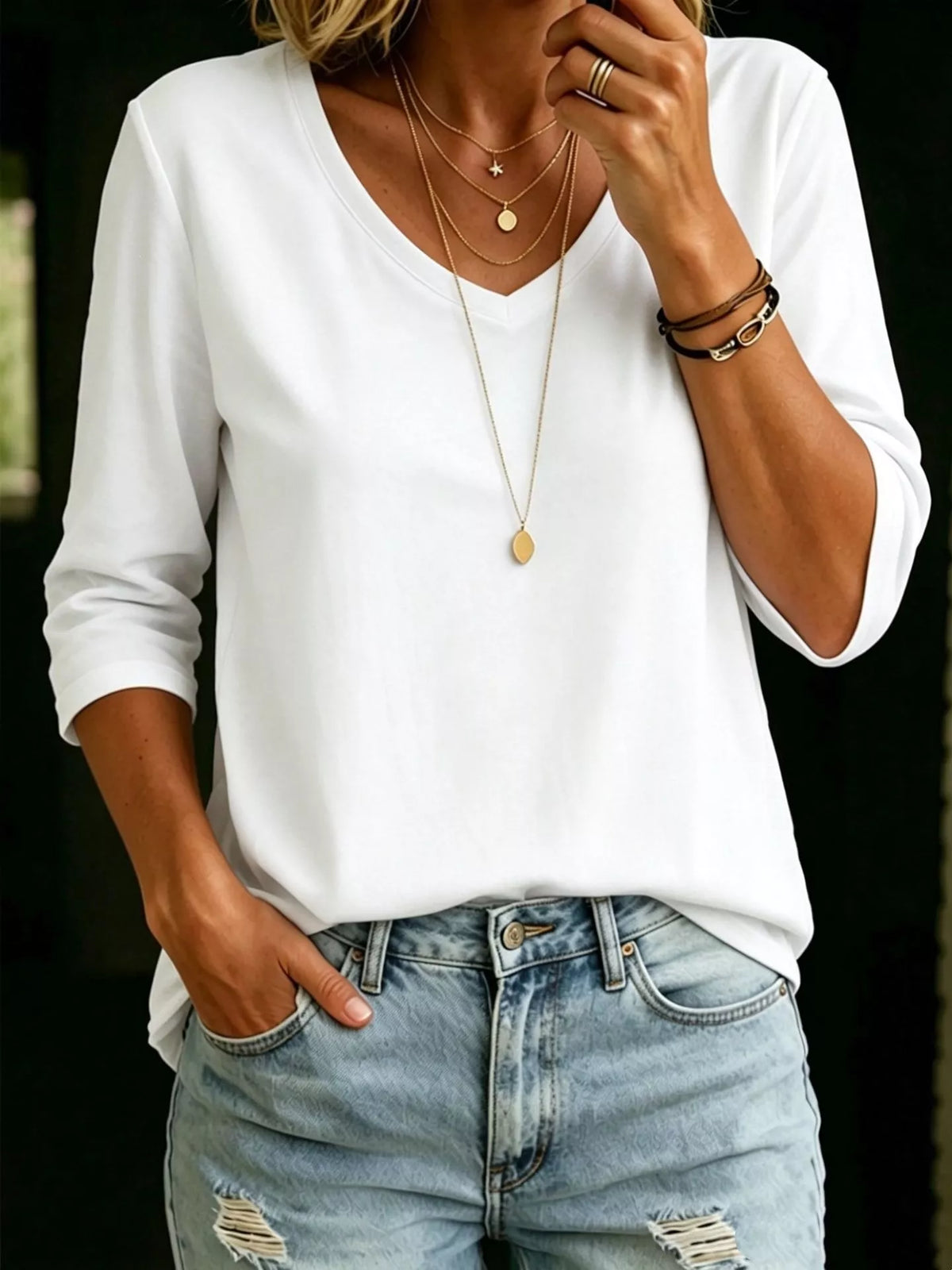 White v neck tee with three quarter sleeves, front view