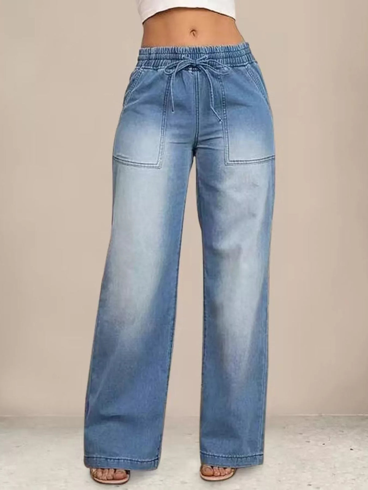 Back view of drawstring wide leg jeans