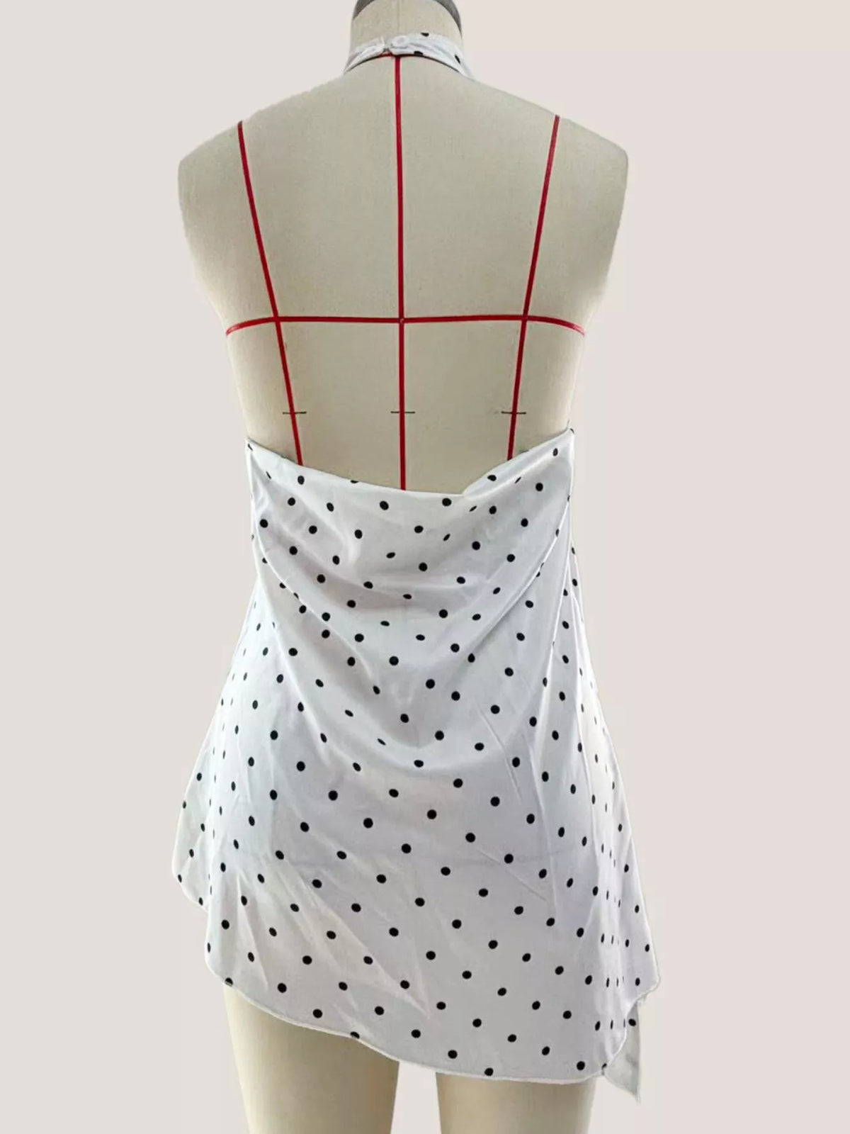 White polka dot top shown from the back