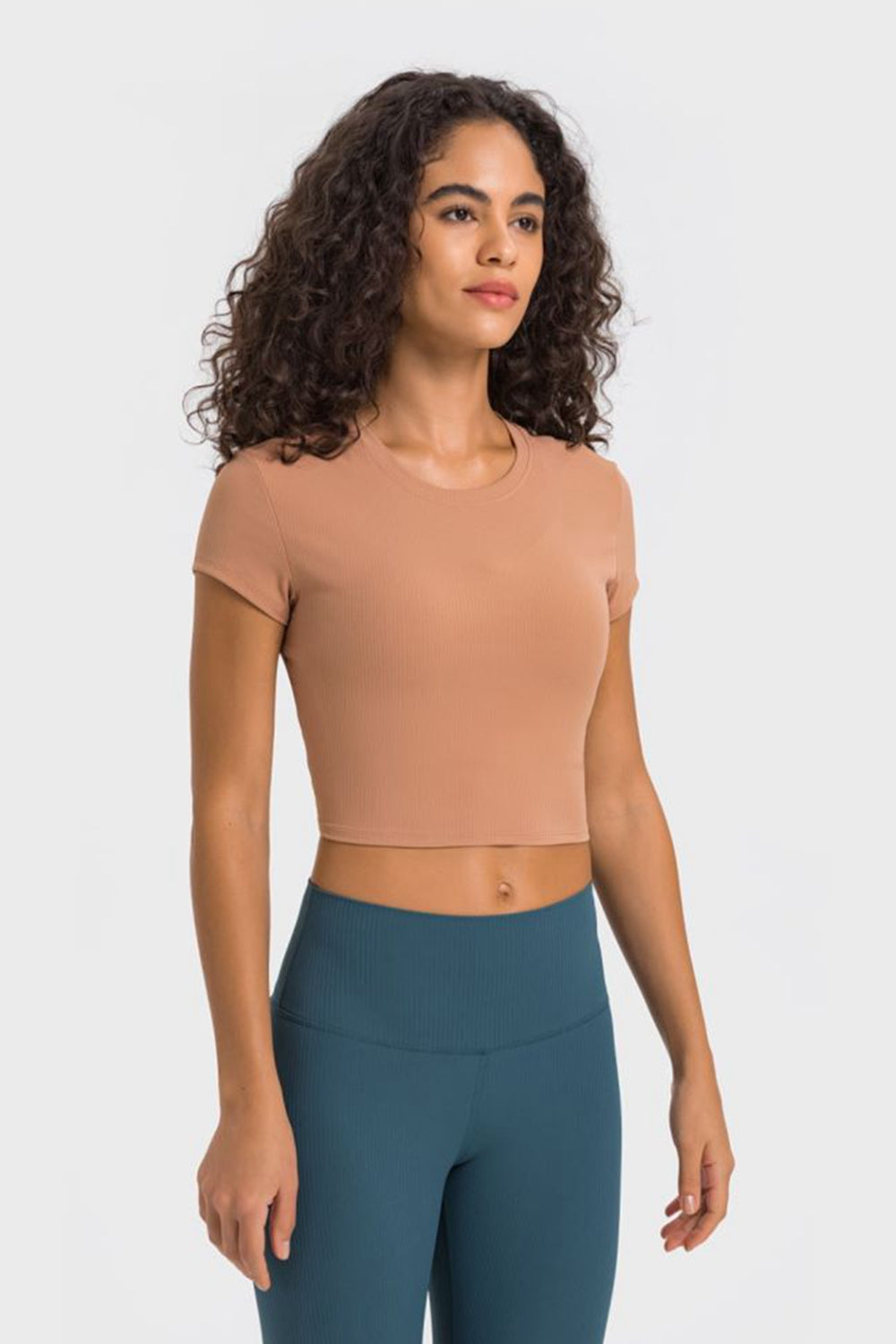 Round neck cropped sports t-shirt angled view