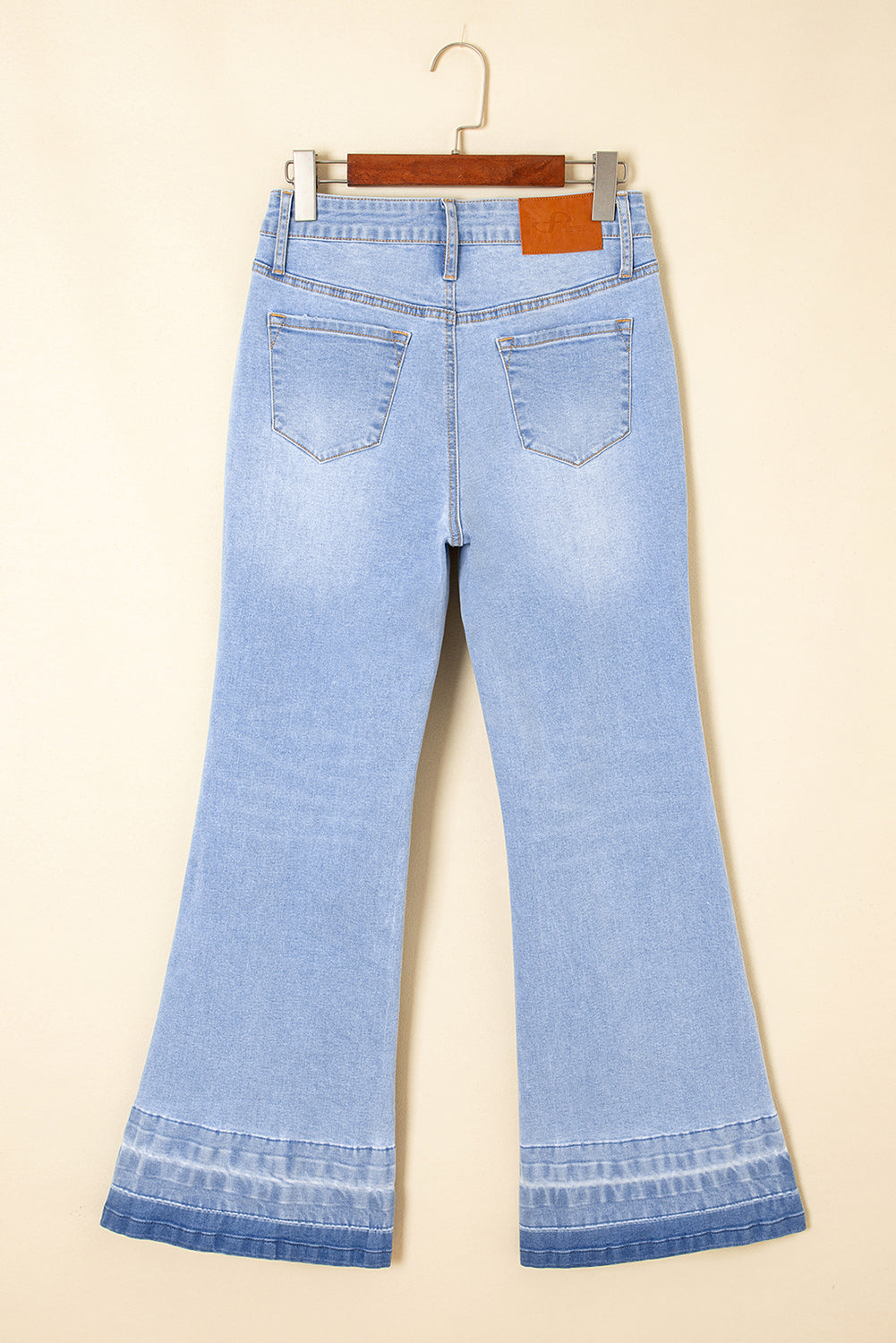 Flare leg jeans worn with casual top